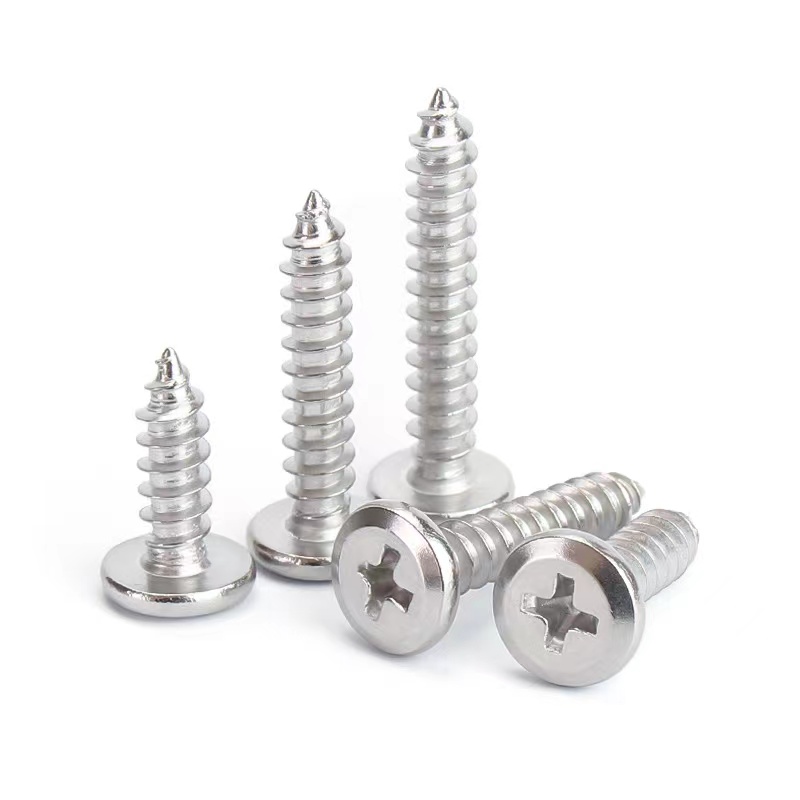 How do you screw in tapping screws?